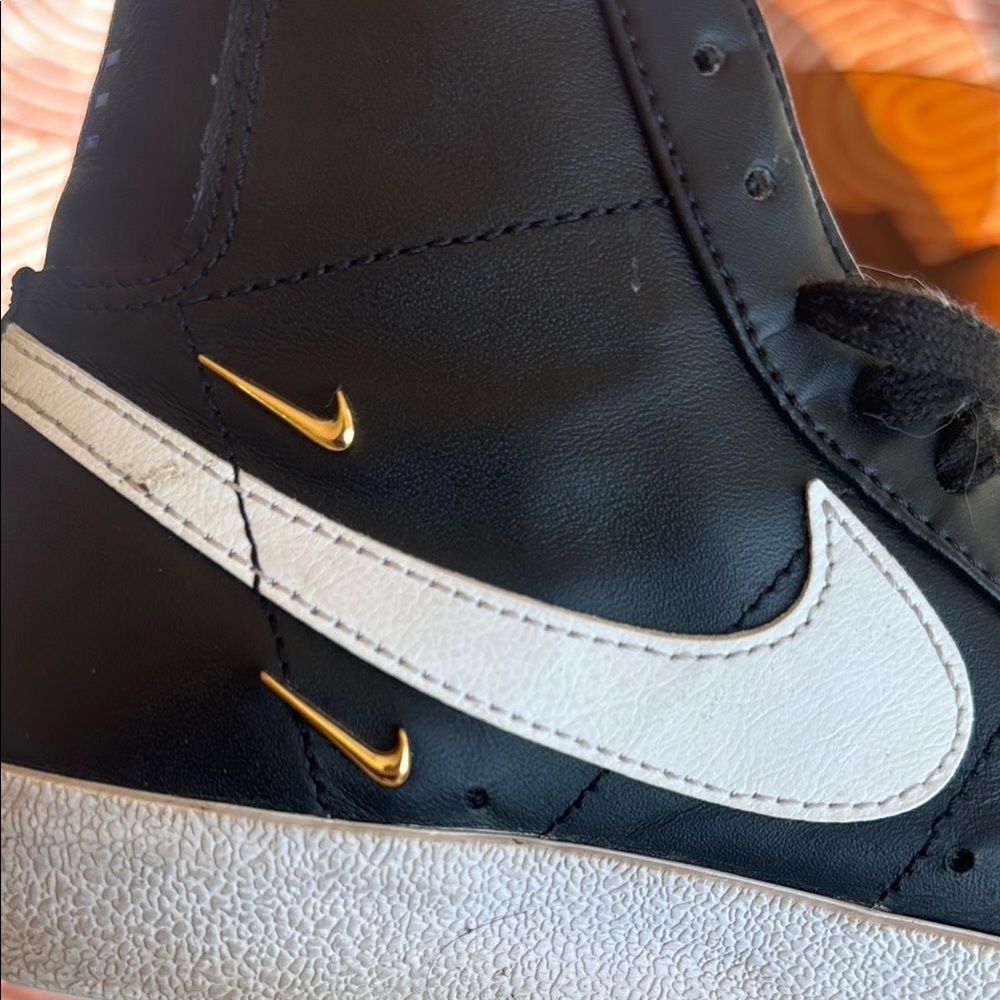 Nike Women's Black White Sneakers with Gold Accents
